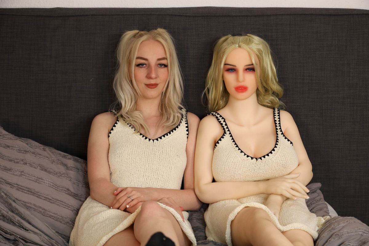 Char Grey, 23, and her husband, Callum, 28, have introduced the lifelike doll - who they've named Dee - into the bedroom at home in Lillington, Warwickshire. Char Grey countered her husband's high sex drive by buying him a sex doll that looks just like her - to take the pressure off if she's not in the mood. See SWNS story SWFTdoll. A long-suffering wife struggling with her husband's high libido has bought a sex doll which looks like her to take the pressure off if she's not in the mood. Char Grey, 23, and her husband, Callum, 28, have since introduced the life-like doll - which they've named Dee - into the bedroom to 'spice things up' and as an alternative to having a threesome with another person. The couple - who earn a living on Only Fans and can earn up £70k a month and even once earnt £10k in a day - were open to exploring group sex, but Char had reservations and was worried she might get jealous. As a 'happy medium', she decided to purchase the £1.5k doll.