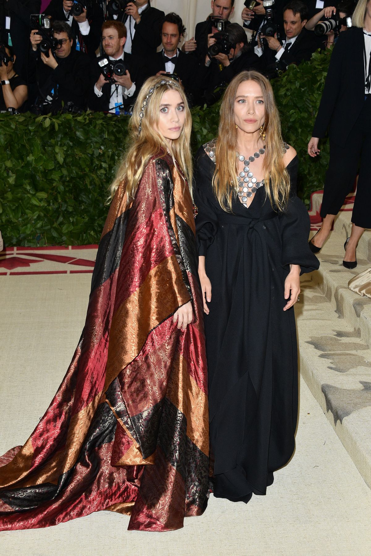 NEW YORK, NY - MAY 07:  Ashley Olsen (L) and Mary-Kate Olsen attend the Heavenly Bodies: Fashion & The Catholic Imagination Costume Institute Gala at the Metropolitan Museum of Art on May 7, 2018 in New York City.  (Photo by George Pimentel/Getty Images)
