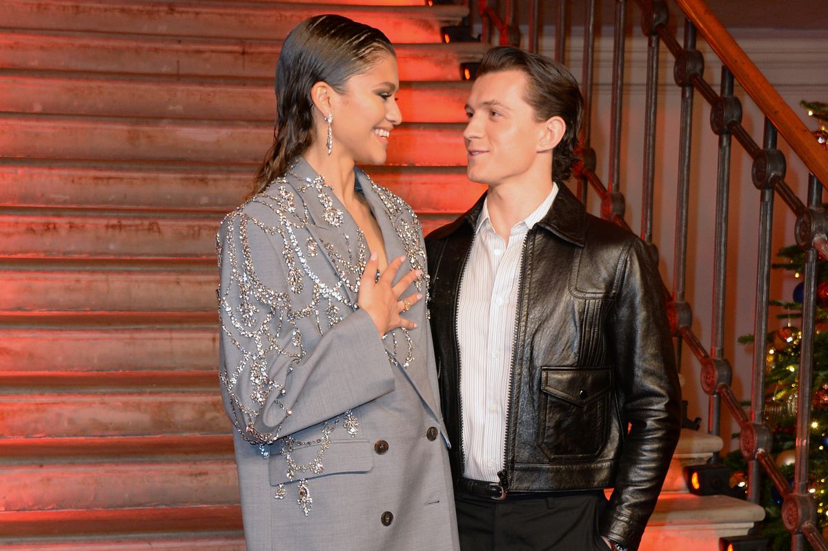 LONDON, ENGLAND - DECEMBER 05: Zendaya and Tom Holland pose at a photocall for "Spider-Man: No Way Home" at The Old Sessions House on December 5, 2021 in London, England. (Photo by David M. Benett/Dave Benett/WireImage)