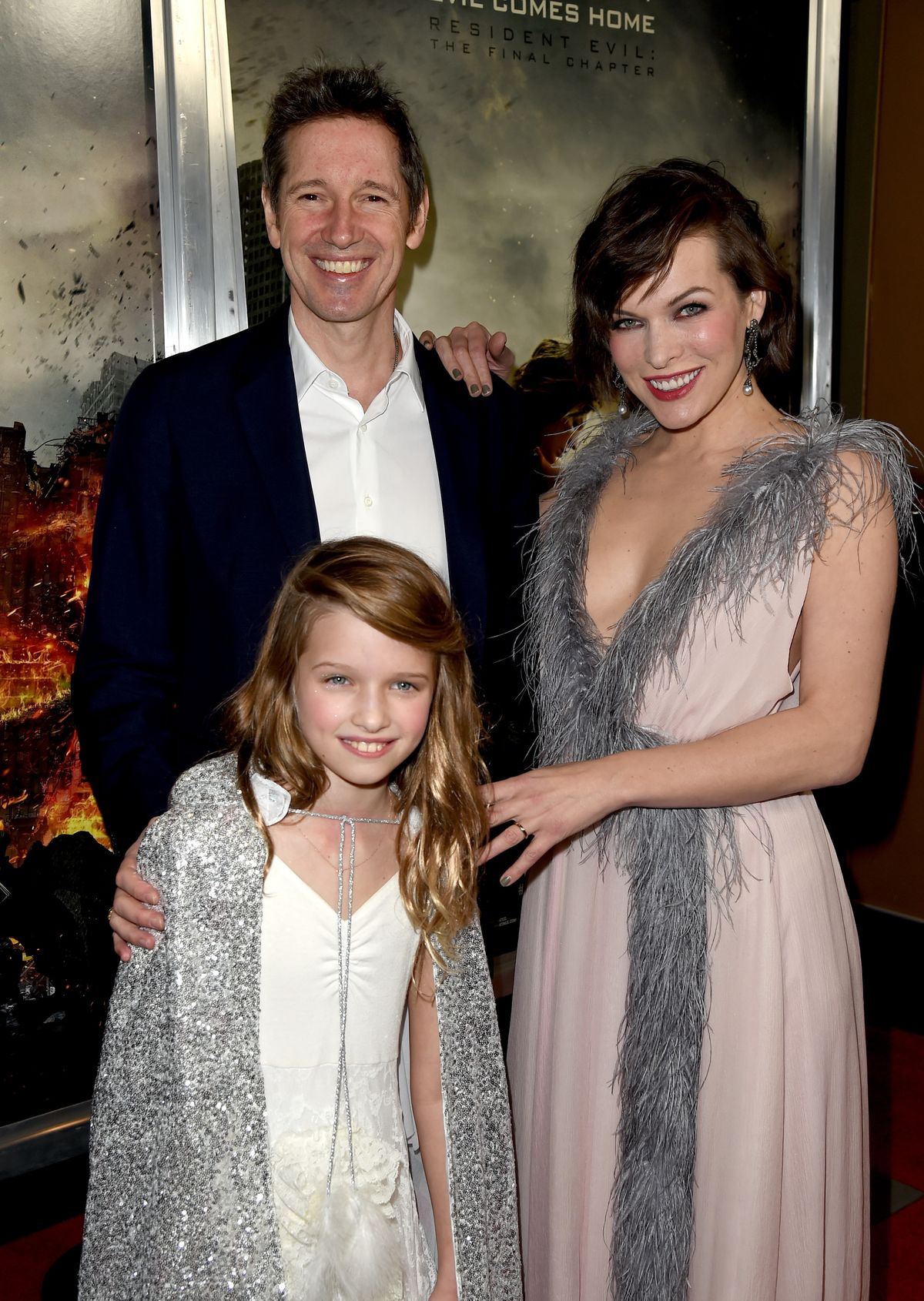 LOS ANGELES, CA - JANUARY 23:  Actress Milla Jovovich, her husband writer/director Paul W.S. Anderson and their daughter actress Ever Gabo Anderson arrive at the premiere of Sony Pictures Releasing's "Resident Evil: The Final Chapter" at the Regal L.A. Live Theatres on January 23, 2017 in Los Angeles, California.  (Photo by Kevin Winter/Getty Images)