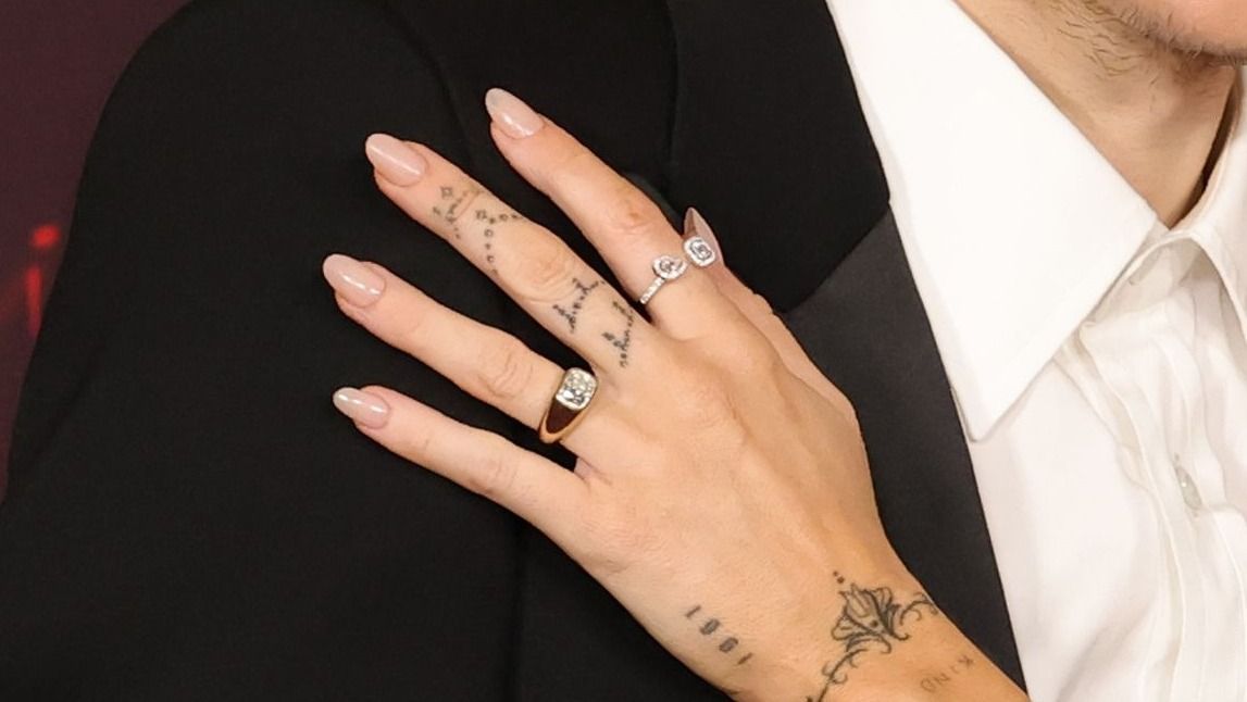 HOLLYWOOD, CALIFORNIA - DECEMBER 01: (L-R) Maxx Morando and Miley Cyrus attend the Global Premiere of 20th Century Studios' "Avatar: Fire And Ash" at Dolby Theatre on December 01, 2025 in Hollywood, California. (Photo by Kevin Winter/WireImage)