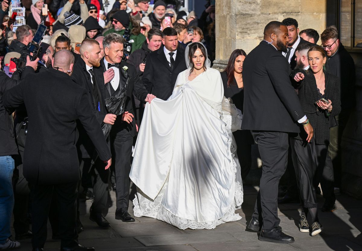 BATH, ENGLAND - DECEMBER 27: Gordon Ramsay and daughter Holly Ramsay arrive for her wedding to Adam Peaty at Bath Abbey on December 27, 2025 in Bath, England. (Photo by Finnbarr Webster/Getty Images)