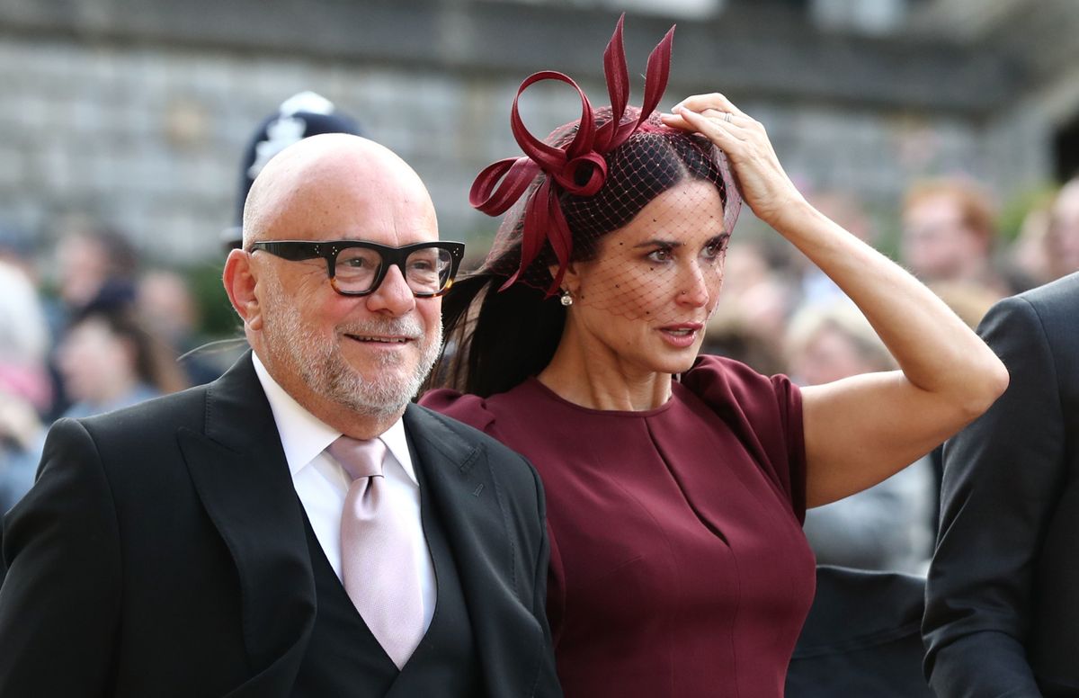 WINDSOR, ENGLAND - OCTOBER 12: Eric Buterbaugh and Demi Moore arrive ahead of the wedding of Princess Eugenie of York to Jack Brooksbank at Windsor Castle on October 12, 2018 in Windsor, England. (Photo by Gareth Fuller - WPA Pool/Getty Images)