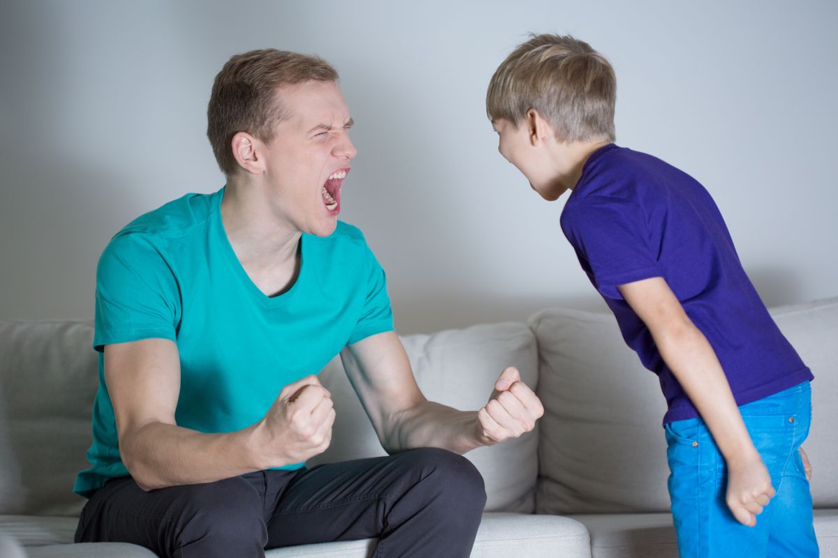 Image of young dad yelling at his son