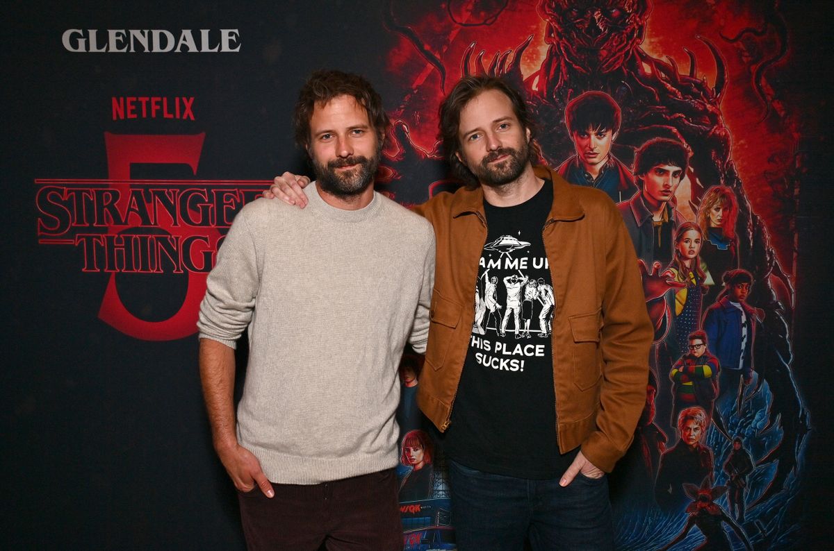 GLENDALE, CALIFORNIA - DECEMBER 31: Ross Duffer and Matt Duffer attend Stranger Things 5: The Finale Fan Screenings at AMC The Americana at Brand 18 on December 31, 2025 in Glendale, California. (Photo by Jerod Harris/Getty Images for Netflix)