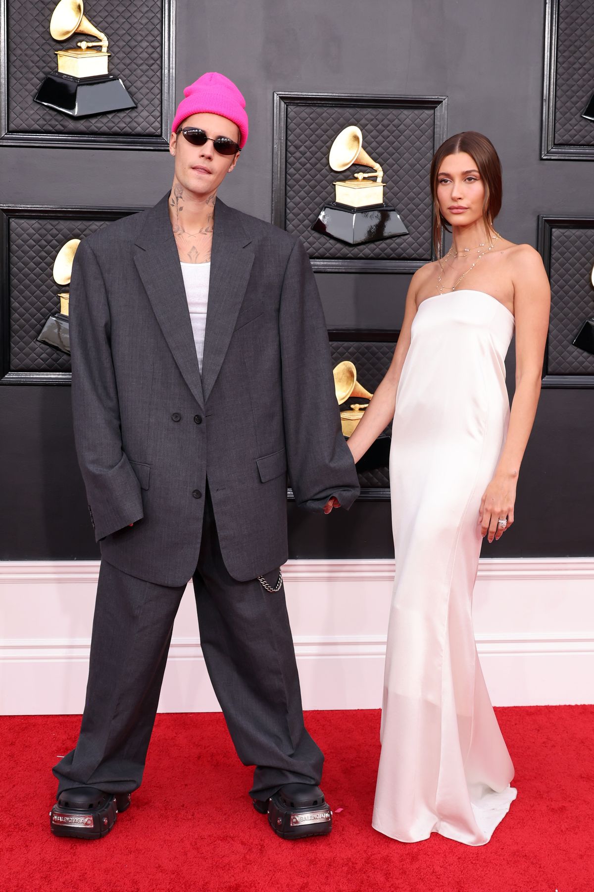 LAS VEGAS, NEVADA - APRIL 03: (L-R) Justin Bieber and Hailey Bieber attend the 64th Annual GRAMMY Awards at MGM Grand Garden Arena on April 03, 2022 in Las Vegas, Nevada. (Photo by Amy Sussman/Getty Images)
