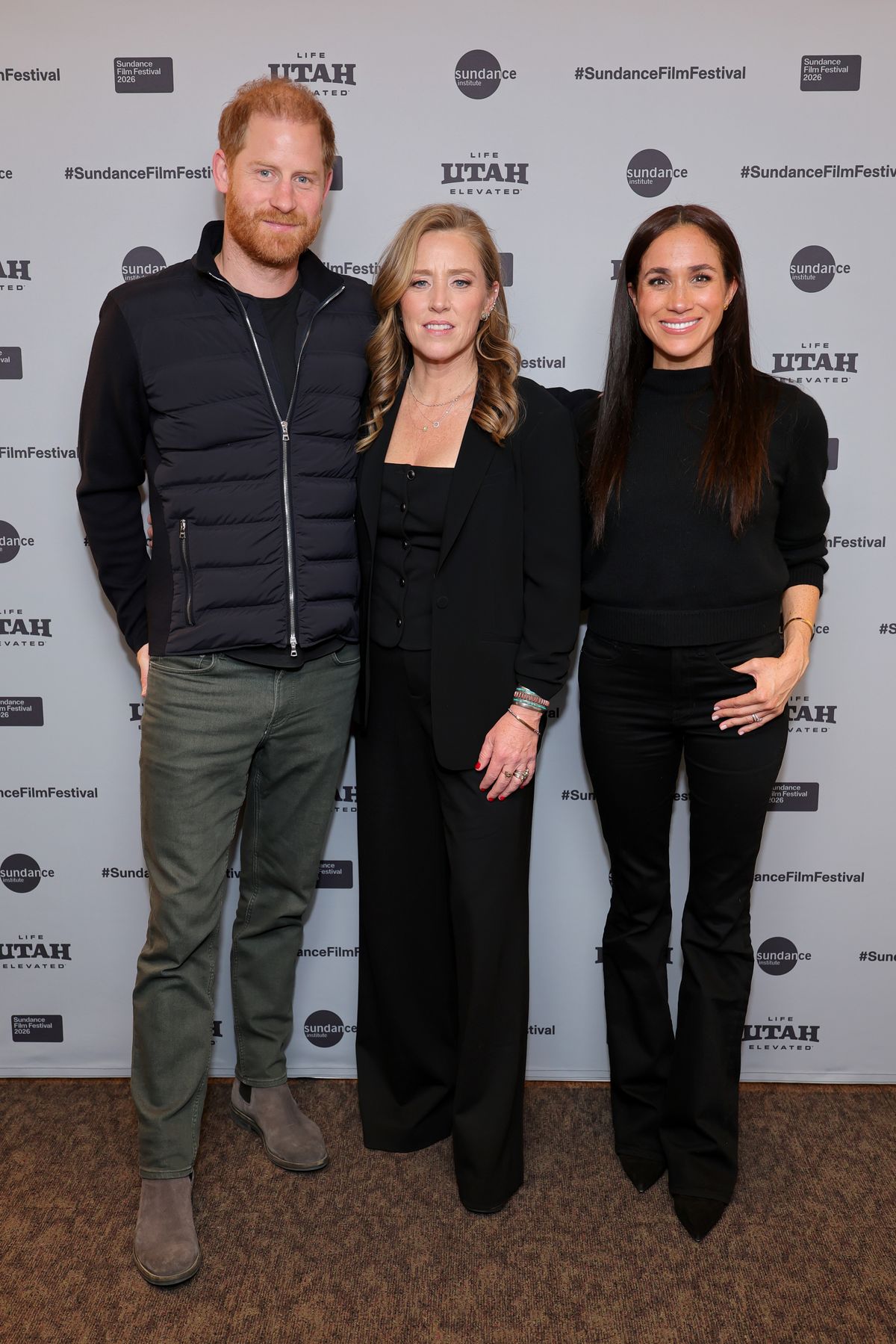 SALT LAKE CITY, UTAH - JANUARY 24: (L-R) Prince Harry, Duke of Sussex, Amy Redford and Meghan, Duchess of Sussex attend the Salt Lake City celebration and premiere of "Cookie Queens" during the 2026 Sundance Film Festival at Rose Wagner Performing Arts Center on January 24, 2026 in Salt Lake City, Utah. (Photo by Neilson Barnard/Getty Images for Sundance Film Festival )