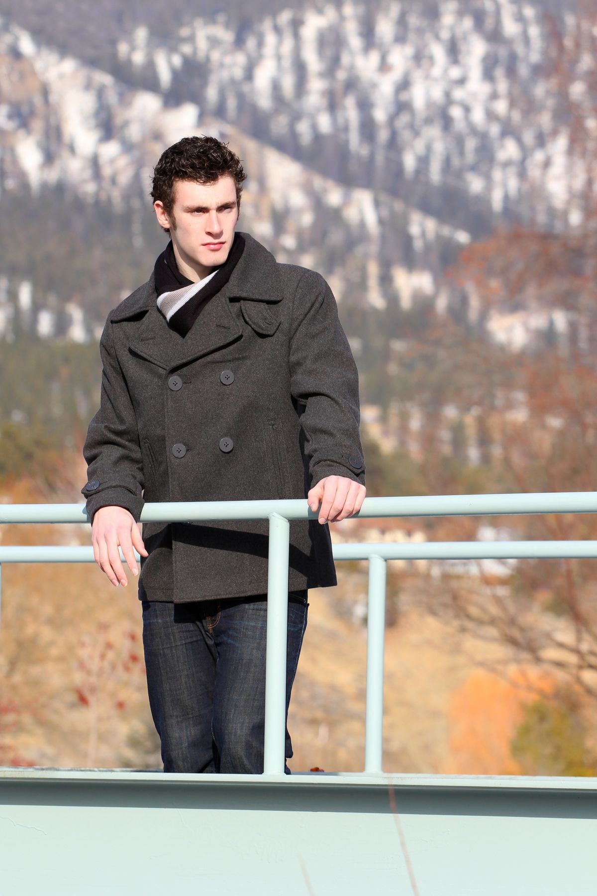 Attractive brunette male outside on a cold winters day