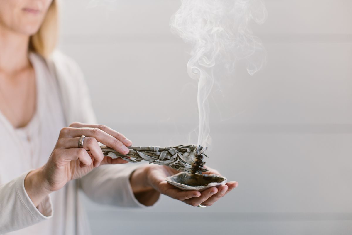 woman burning sage