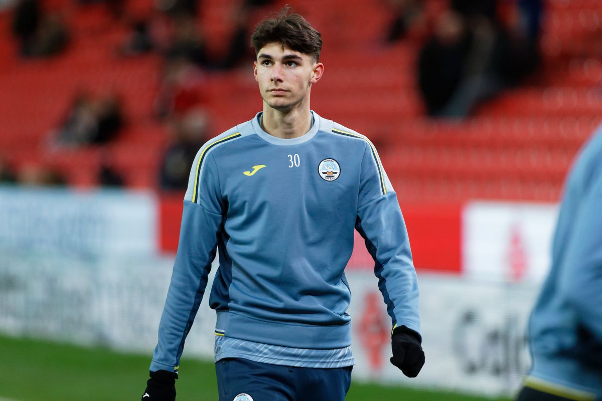 STOKE ON TRENT, ENGLAND - FEBRUARY 08: Finley Burns of Swansea City warms up prior to the game during the Sky Bet Championship match between Stoke City and Swansea City at the bet365 Stadium on February 08, 2022 in Stoke on Trent, England. (Photo by Athena Pictures/Getty Images)