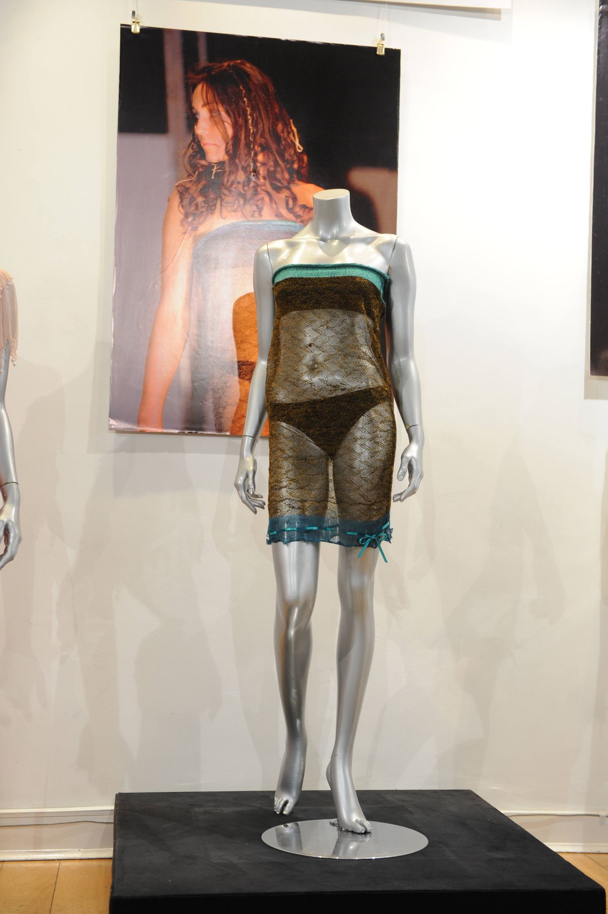 16th March 2011. Charlotte Todd with the dress she designed whilst a degree student at the University of The West of England in 2000. She was working on a project titled 'The Art of Seduction'. The dress was worn by Kate Middleton at the annual St Andrew's University charity fashion show attended by Prince William in 2002. The dress is to be auctioned in London by Kerry Taylor Auctions with an estimate of £8000-£10000. (Photo by Justin Goff Photos/Getty Images)