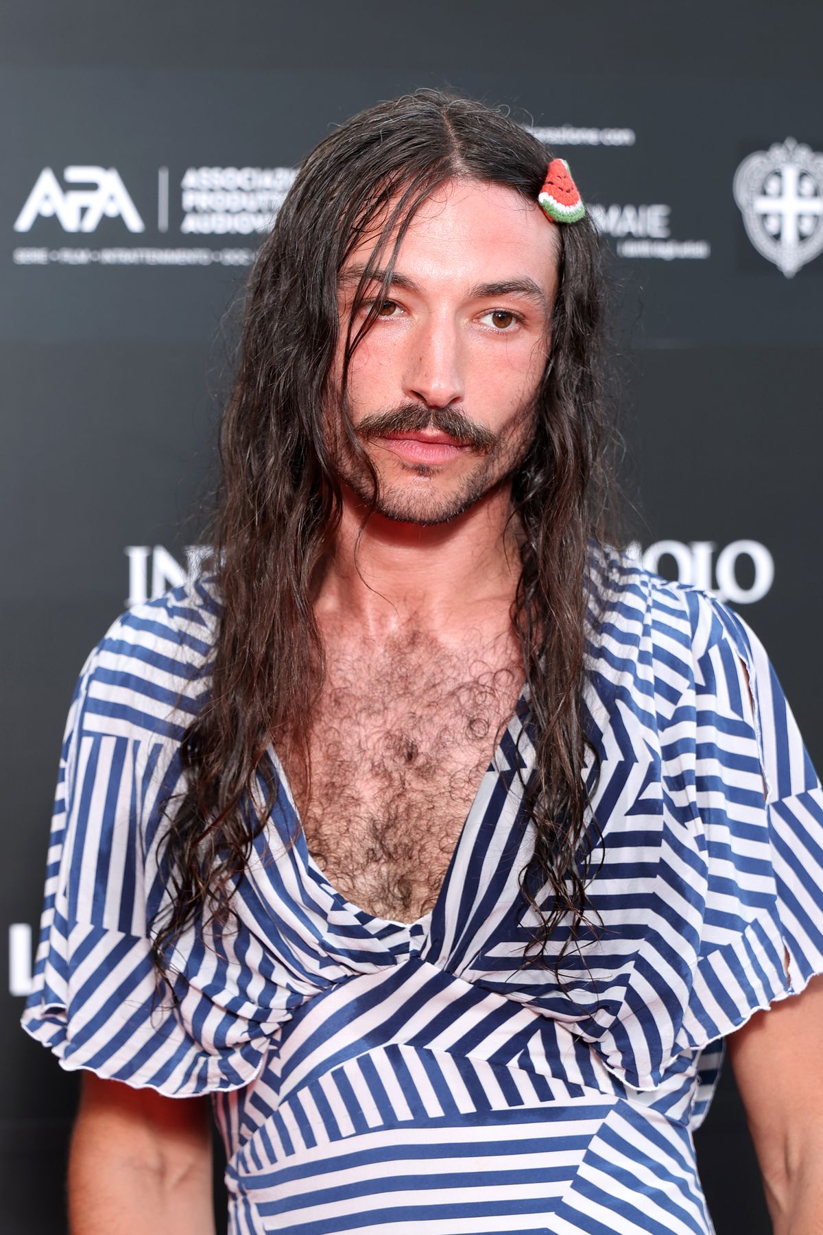 SANTA MARGHERITA DI PULA, ITALY - JUNE 21: Ezra Miller attends the Filming Italy 2025 red carpet at Forte Village Resort on June 21, 2025 in Santa Margherita di Pula, Italy. (Photo by Daniele Venturelli/Getty Images)