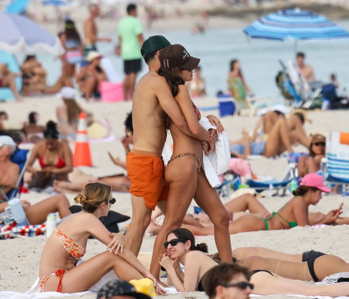 *PREMIUM-EXCLUSIVE* Miami Beach, FL   Jessica Alba and Danny Ramirez turn up the heat during a romantic post-Valentine’s Day escape on Miami Beach. The duo shared kisses on their loungers at The Setai, with Alba rocking a printed bikini and baseball cap while Ramirez kept it cool in bright orange swim shorts as they sipped cocktails by the shore.

*UK Clients - Pictures Containing Children
Please Pixelate Face Prior To Publication*,Image: 1075718993, License: Rights-managed, Restrictions: , Model Release: no, Pictured: Jessica Alba, Danny Ramirez