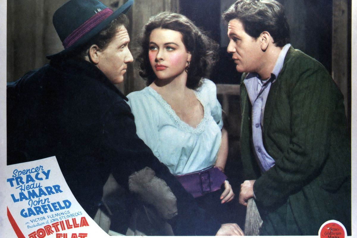 Természetesen színházban is játszott. Ez a fotó egy 1942-es előcsarnoki kártya, amin (balról jobbra) Spencer Tracy, Hedy Lamarr és John Garfield látható. 