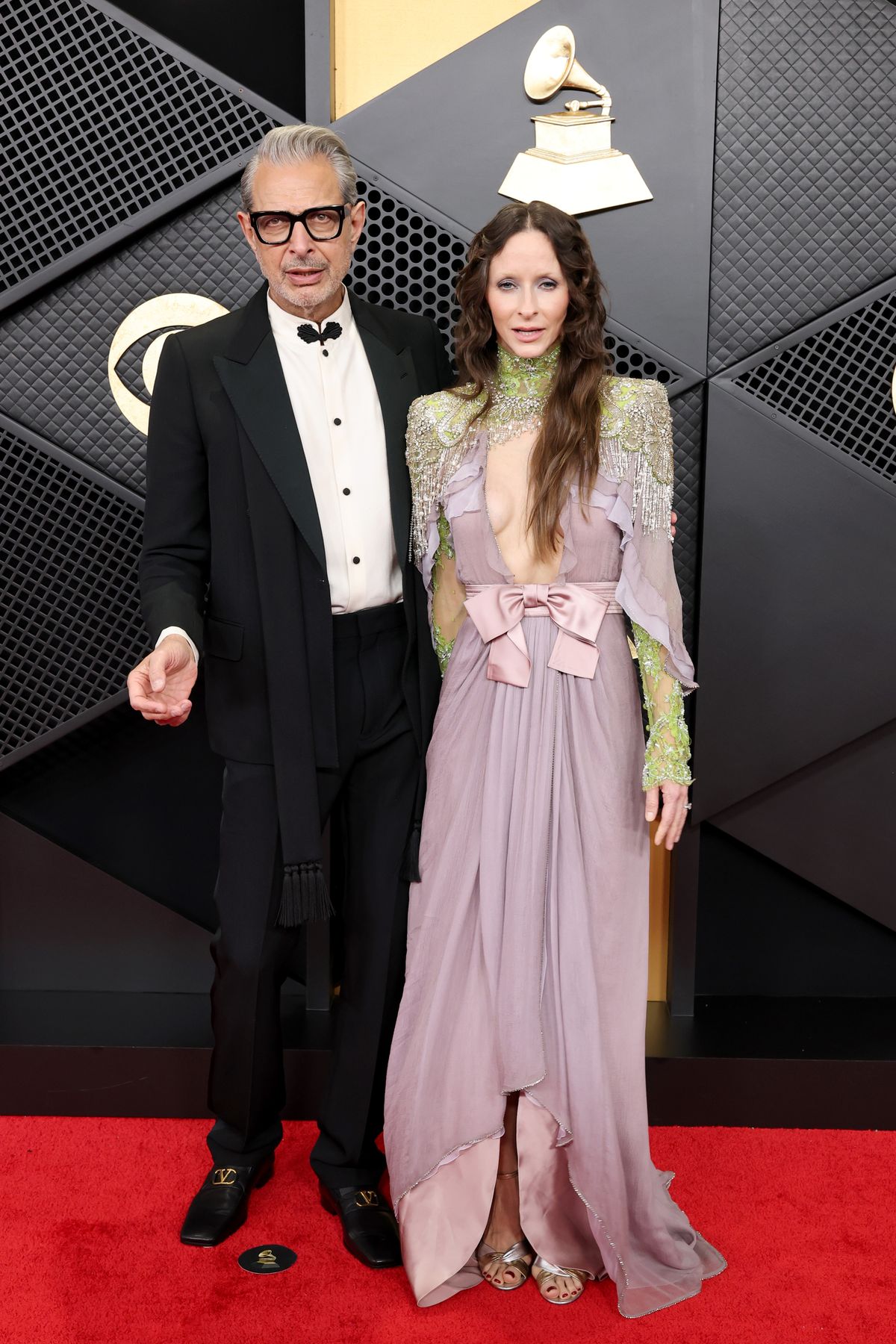 LOS ANGELES, CALIFORNIA - FEBRUARY 01: (FOR EDITORIAL USE ONLY) (L-R) Jeff Goldblum and Emilie Livingston attend the 68th GRAMMY Awards at Crypto.com Arena on February 01, 2026 in Los Angeles, California. (Photo by Amy Sussman/Getty Images)
