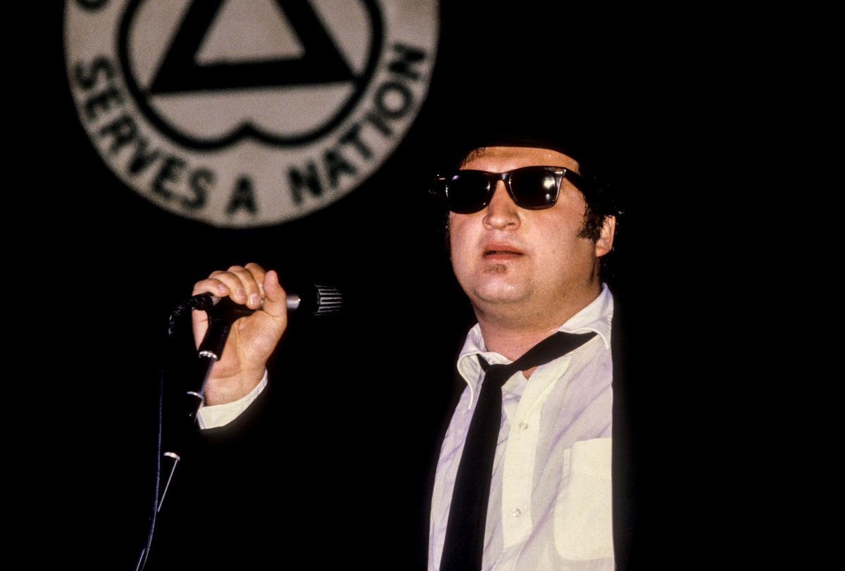 CONCORD, CA - JULY 31:  John Belushi performs with The Blues Brothers at Concord Pavilion on July 31, 1980 in Concord, California.  (Photo by Ed Perlstein/Redferns/Getty Images)
