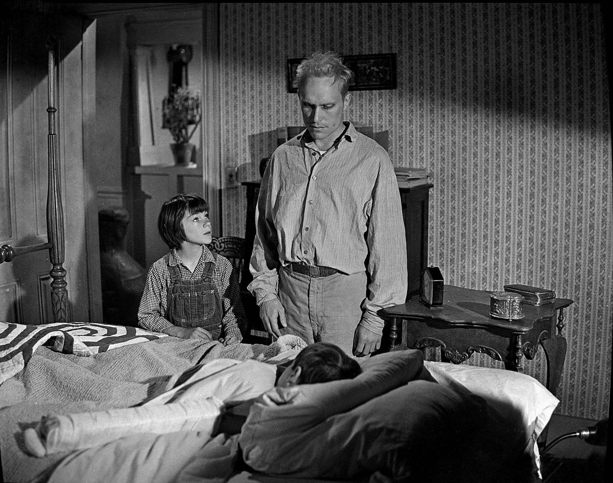 Mary Badham, Robert Duvall &amp; Phillip Alford  Characters: Scout,Arthur 'Boo' Radley &amp; Jem Film: To Kill A Mockingbird (USA 1962)  Director: Robert Mulligan 25 December 1962     Date: 25-Dec-62,Image: 418548458, License: Rights-managed, Restrictions: Please use full Credit line: Mary Evans/AF Archive. **Warning** This Photograph is for editorial use only and is the copyright of Universal and/or the Photographer assigned by the Film or Production Company &amp; can only be reproduced by publications in c, Model Release: no