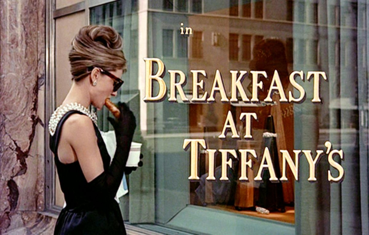 NEW YORK - OCTOBER 5: The movie "Breakfast at Tiffany's", directed by Blake Edwards and based on the novel by Truman Capote. Seen here, Audrey Hepburn as Holly Golightly during the opening sequence, pausing in front of Tiffany's jewelry store in New York City. Initial theatrical release October 5, 1961. Screen capture. Paramount Pictures. (Photo by CBS via Getty Images)
