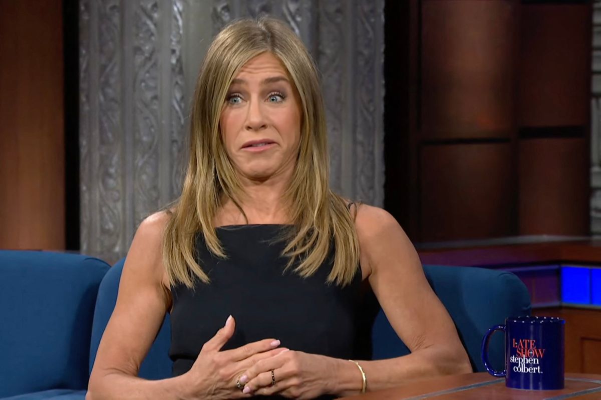 Picture MUST credit: CBS Friends star Jennifer Aniston went on TV to help find homes for rescue pups. She revealed she has always owned rescue dogs herself and the first she ever adopted was an extra on the Friends set. His name was Norman and she has a tattoo on her foot in his memory. Jennifer, 56, also showed off a cook book for kids named after one of her two current dogs, named Clyde, which has recipes children can make with their parents. Aniston appeared on the Stephen Colbert talk show in the US to promote the latest series of her AppleTV+ comedy drama The Morning Show. She said first dog Norman wasn’t the most cooperative co-star when he made a guest appearance on the iconic sitcom, which led to him going home with her. Picture supplied by JLPPA