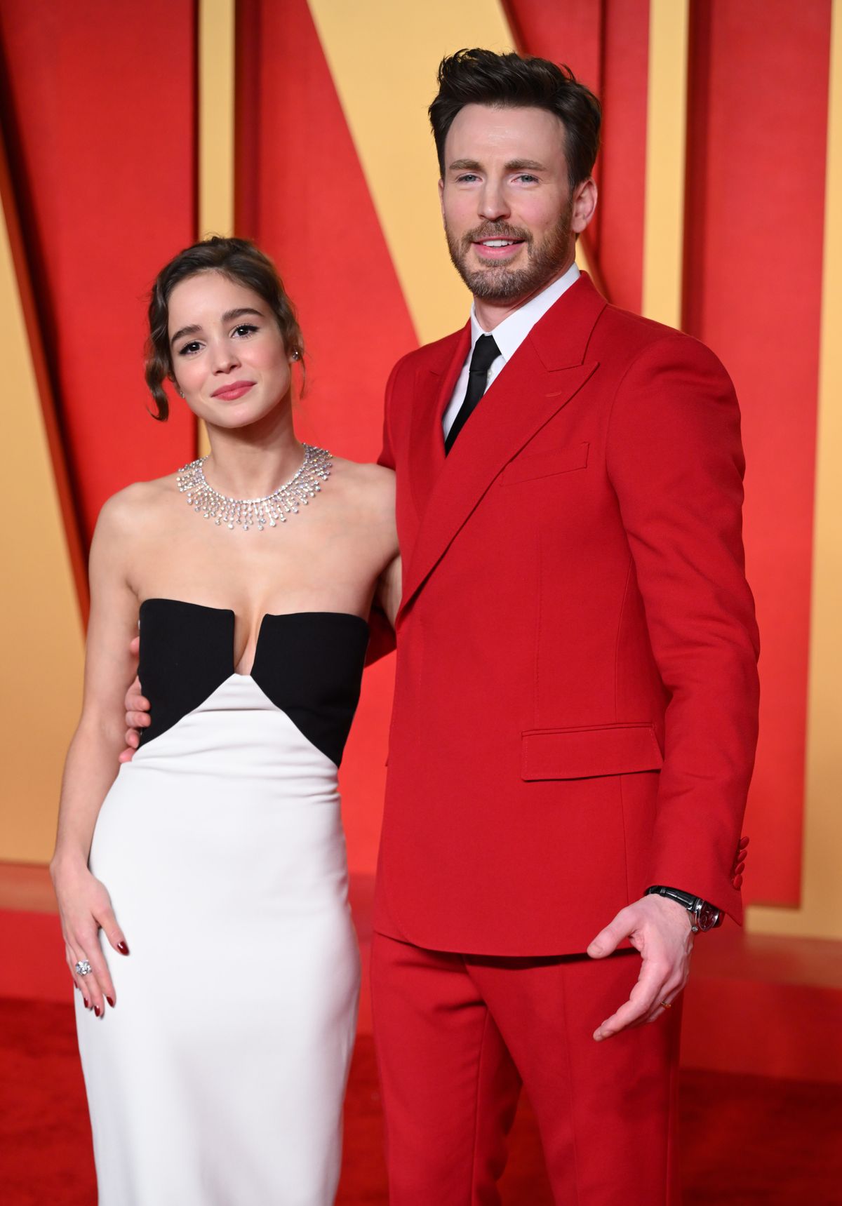 BEVERLY HILLS, CALIFORNIA - MARCH 10: Alba Baptista and Chris Evans attend the 2024 Vanity Fair Oscar Party hosted by Radhika Jones at the Wallis Annenberg Center for the Performing Arts on March 10, 2024 in Beverly Hills, California. (Photo by Karwai Tang/WireImage)