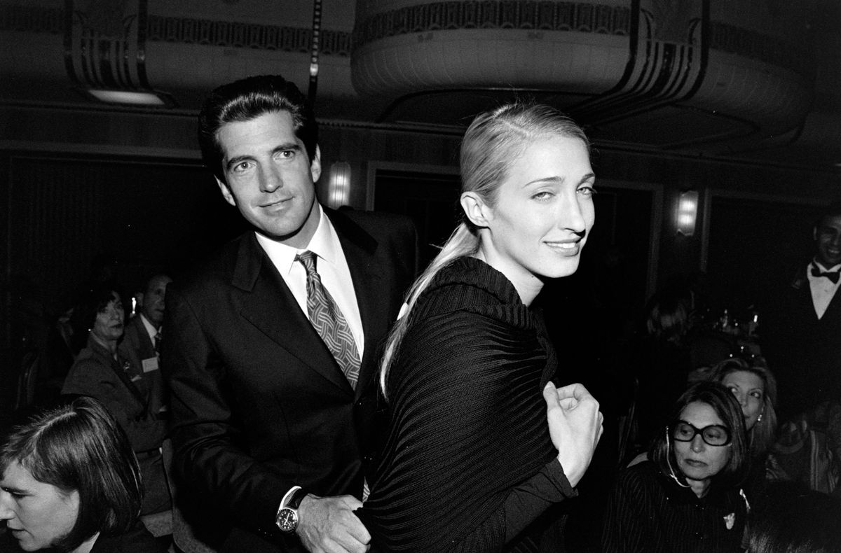 John F. Kennedy Jr. and Carolyn Bessette-Kennedy attend a Breast Cancer Research Foundation luncheon at the Waldorf-Astoria Hotel in New York City on October 20, 1998. (Photo by David Turner/Penske Media via Getty Images)