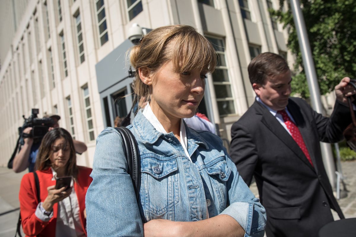NEW YORK, NY - JUNE 12: Actress Allison Mack exits the U.S. District Court for the Eastern District of New York following a status conference, June 12, 2018 in the Brooklyn borough of New York City. Mack was charged in April with sex trafficking for her involvement with a self-help organization for women that forced members into sexual acts with their leader. The group, called Nxivm, was led by founder Keith Raniere, who was arrested in March on sex-trafficking charges. (Photo by Drew Angerer/Getty Images)