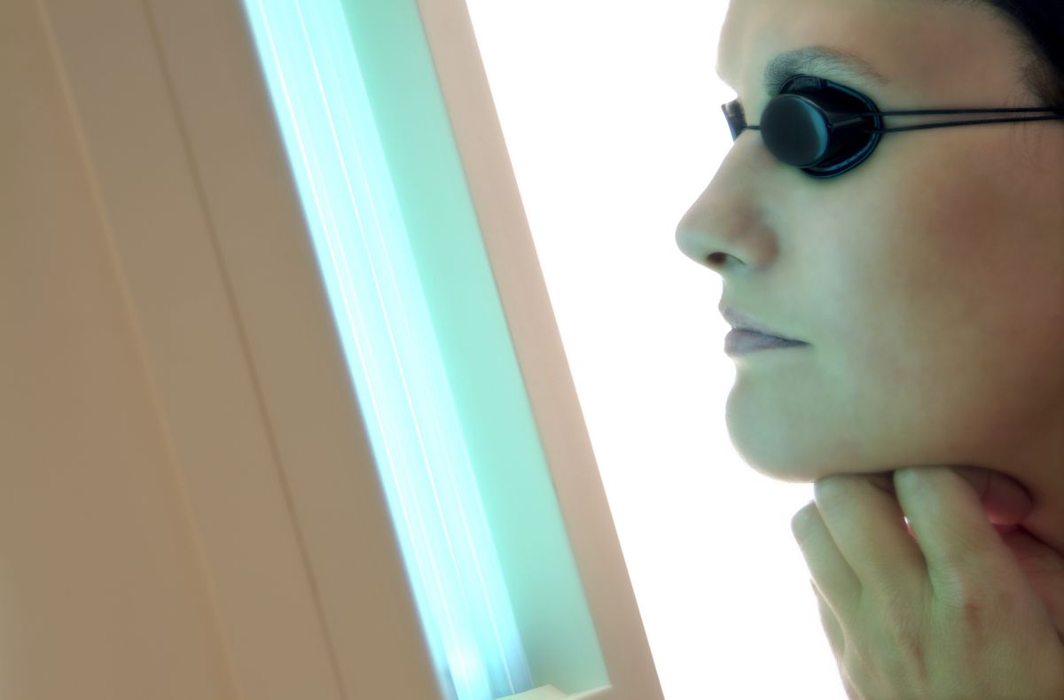 in front of a facial tanning thingie...