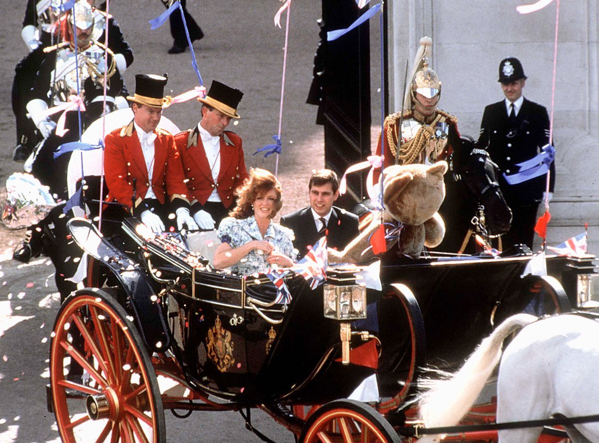LONDON, UNITED KINGDOM - JULY 23:  The Duke And Duchess Of York Leaving Buckingham Palace In A Carriage With A Huge Teddy Bear And Balloons As They Start Their Honeymoon Together  (Photo by Tim Graham Photo Library via Getty Images)