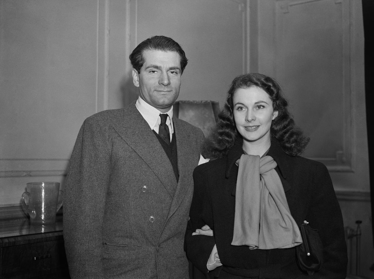 13th January 1941:  Actor Laurence Olivier (1907 - 1989) with his wife, actress Vivien Leigh (Vivian Mary Hartley) (1913 - 1967) after their arrival in England from Hollywood to play their part in WW II. Olivier hopes to join the RAF and Vivien Leigh intends to join a touring company.  (Photo by George W. Hales/Fox Photos/Hulton Archive/Getty Images)