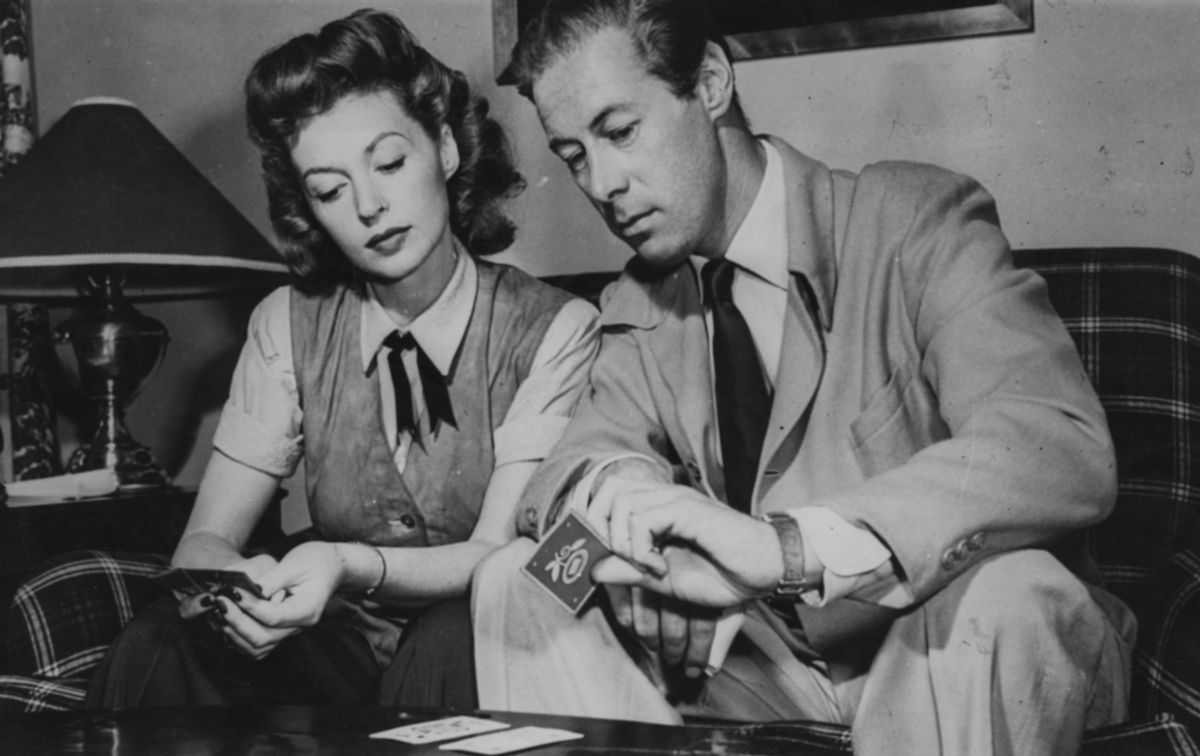 Actors and spouses Lilli Palmer and Rex Harrison pictured playing a card game at their home in Hollywood, circa 1950. (Photo by Keystone Features/Hulton Archive/Getty Images)