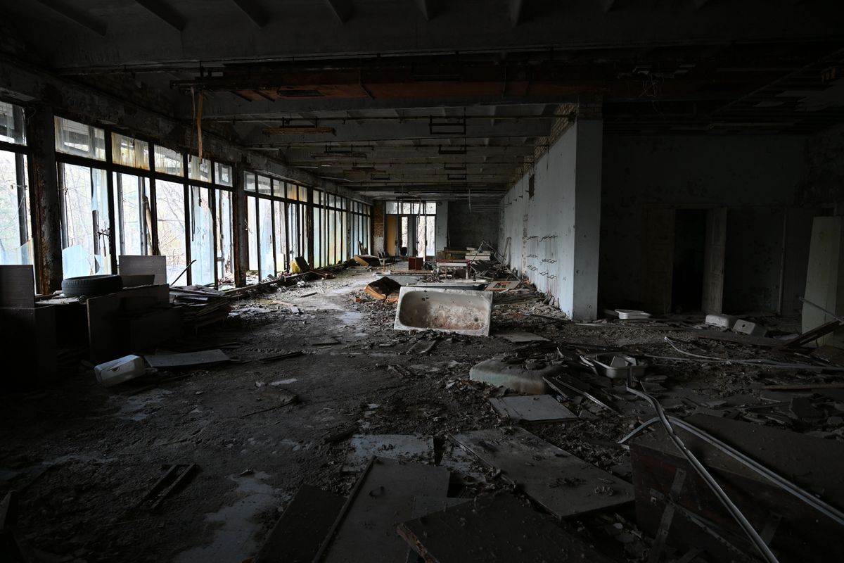 The ground floor of an abandoned 16-storey building, known as the ''white house,'' is seen at 6 Kurchatova Street in the ghost town of Prypiat, radioactively contaminated by the Chornobyl disaster, Kyiv region, Ukraine, on April 23, 2026. Prypiat, located two kilometers from the nuclear power plant, was evacuated on April 27, 1986, following the explosion of the fourth reactor at the Chornobyl Nuclear Power Plant. April 26, 2026, marks the 40th anniversary of the disaster, one of the worst man-made catastrophes in the history of nuclear power. (Photo by Yevhen Kotenko/Ukrinform/NurPhoto via Getty Images)