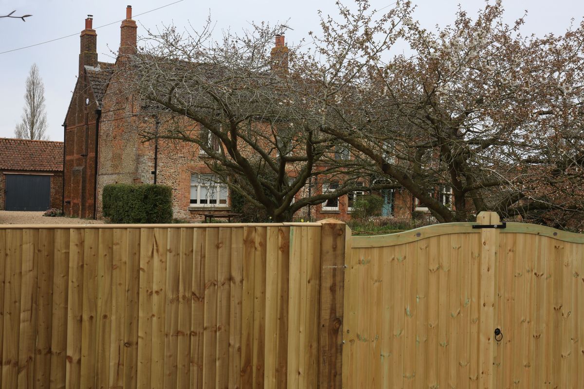 SANDRINGHAM, NORFOLK - MARCH 23: A general view of Marsh Farm showing new wooden gates where Andrew Mountbatten-Windsor is due to relocate from Wood Farm on the Sandringham estate, on March 23, 2026 in Sandringham, Norfolk. The former prince was evicted from his long-time home at Royal Lodge in Windsor after King Charles IIIstripped Andrew of his royal titles over his ties to Jeffrey Epstein. On February 19 the former prince was arrested on suspicion of misconduct in public office following a police investigation into the Epstein files. He was released under investigation and returned to Wood Farm on the Sandringham Estate. The former prince continues to deny any wrongdoing. (Photo by Martin Pope/Getty Images)