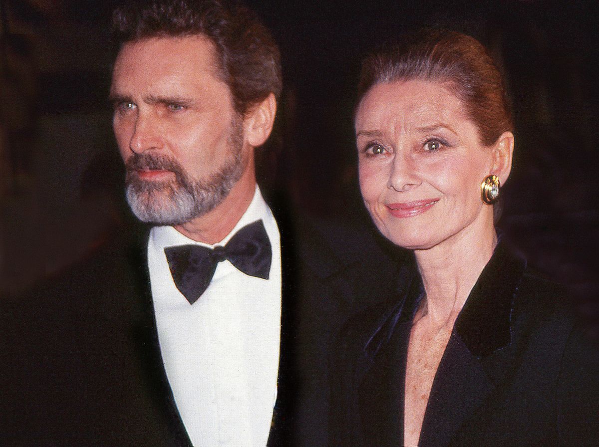 Long-time campanions Dutch actor Robert Wolders and British actress Audrey Hepburn (1929 - 1993) attend a gala at the Waldorf Astoria Hotel, New York, New York, 1988. (Photo by Rose Hartman/Getty Images)