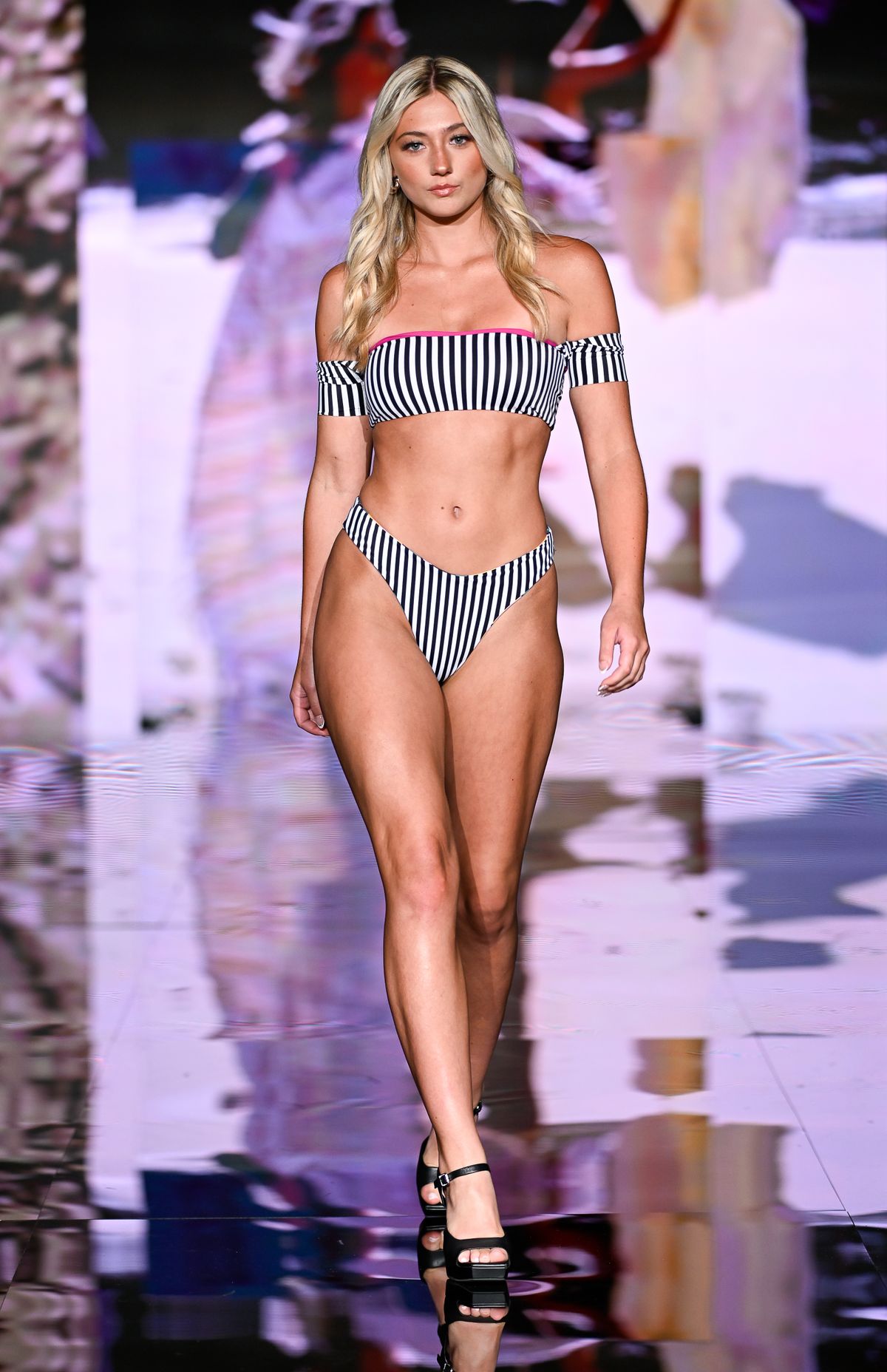 MIAMI BEACH, FLORIDA - MAY 29: A model walks the runway at the Strange Bikinis show during Miami Swim Week Powered By Art Hearts Fashion at Eden Roc Hotel on May 29, 2025 in Miami Beach, Florida. (Photo by Arun Nevader/Getty Images for Art Hearts Fashion)