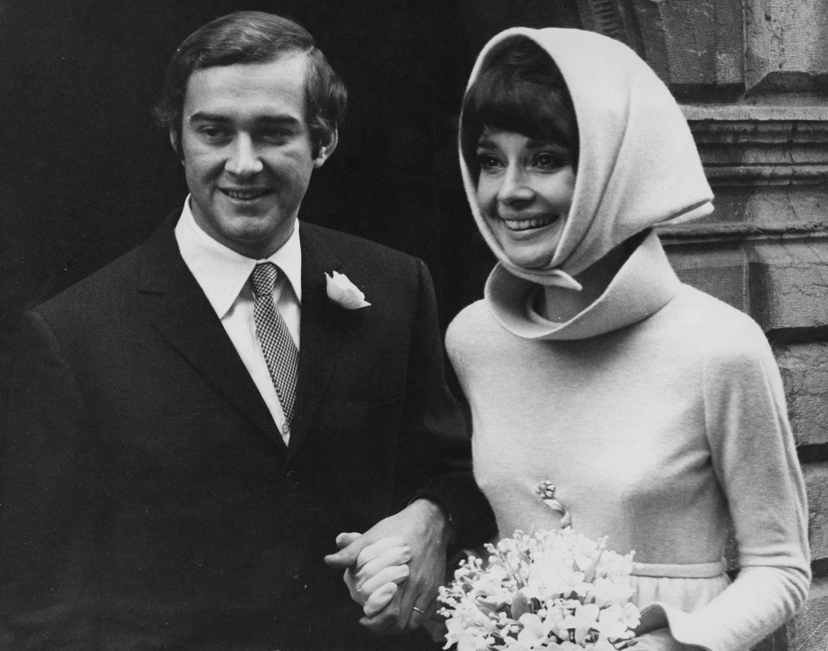 Belgian-born actress Audrey Hepburn (1929 - 1993) with her second husband, Italian psychiatrist Andrea Dotti (1938 - 2007), after their wedding, Morges, Switzerland, 18th January 1969. (Photo by Daily Express/Pictorial Parade/Archive Photos/Getty Images)