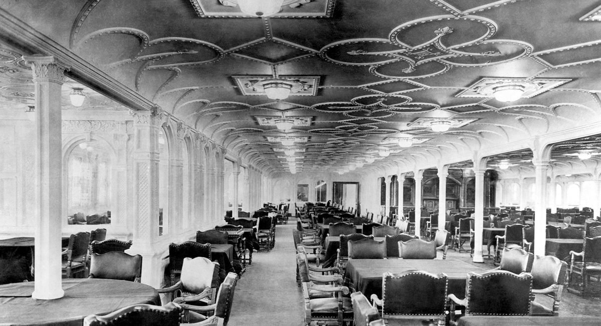 UK: RMS Titanic, The First Class Dining Room, c. 1912. (Photo by: Pictures from History/Universal Images Group via Getty Images)