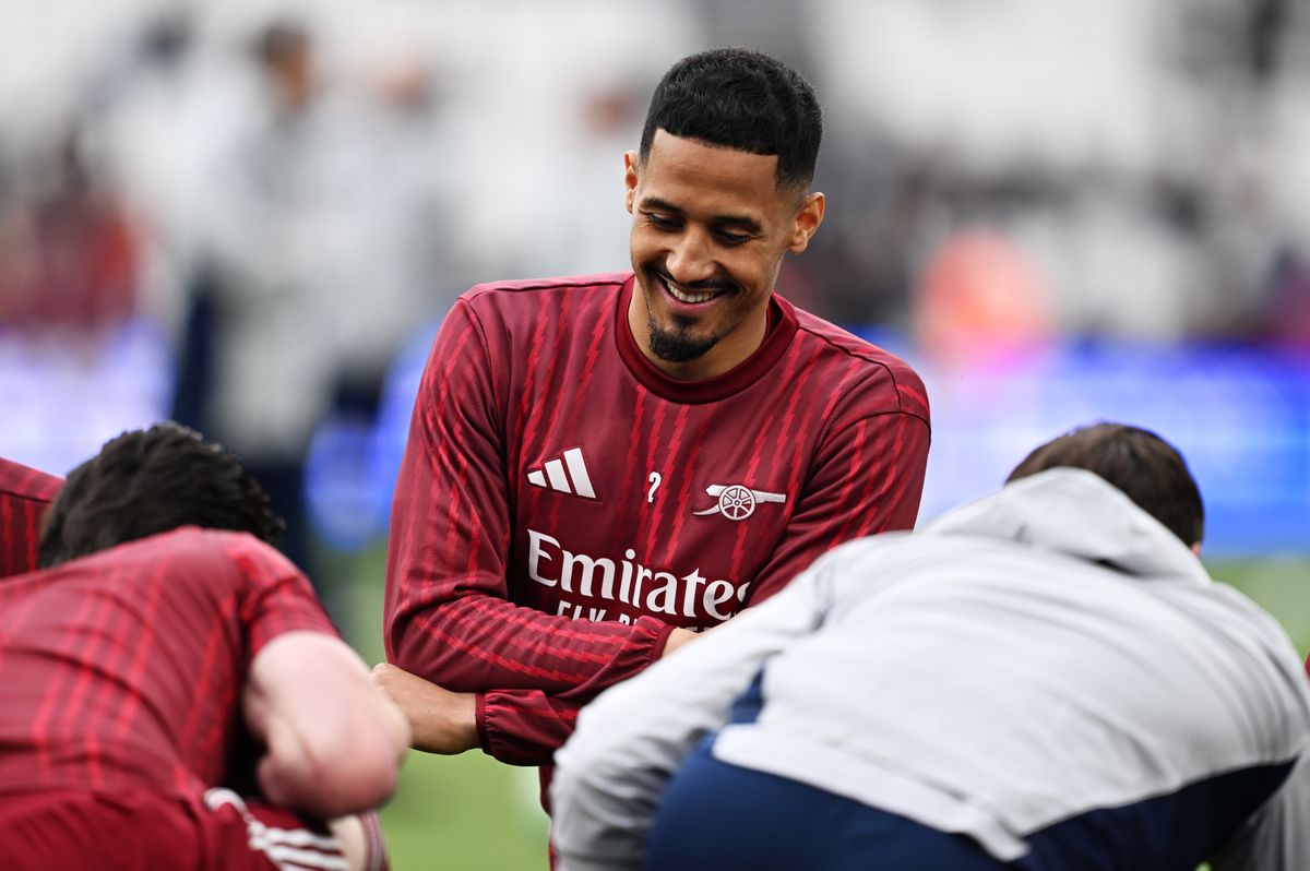 LONDON, ENGLAND - MAY 10: William Saliba of Arsenal warms up with teammates prior to the Premier League match between West Ham United and Arsenal at London Stadium on May 10, 2026 in London, England. (Photo by David Price/Arsenal FC via Getty Images)