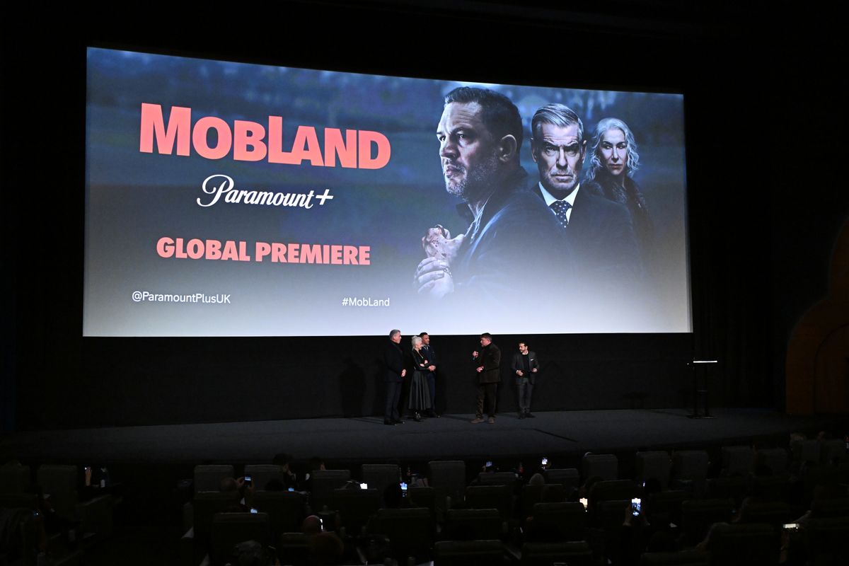 LONDON, ENGLAND - MARCH 27: (L-R) Pierce Brosnan, Dame Helen Mirren, Tom Hardy, Guy Ritchie and David Glasser onstage during the Global Premiere of "MobLand" at Odeon Luxe Leicester Square on March 27, 2025 in London, England. (Photo by Kate Green/Getty Images for Paramount Plus)