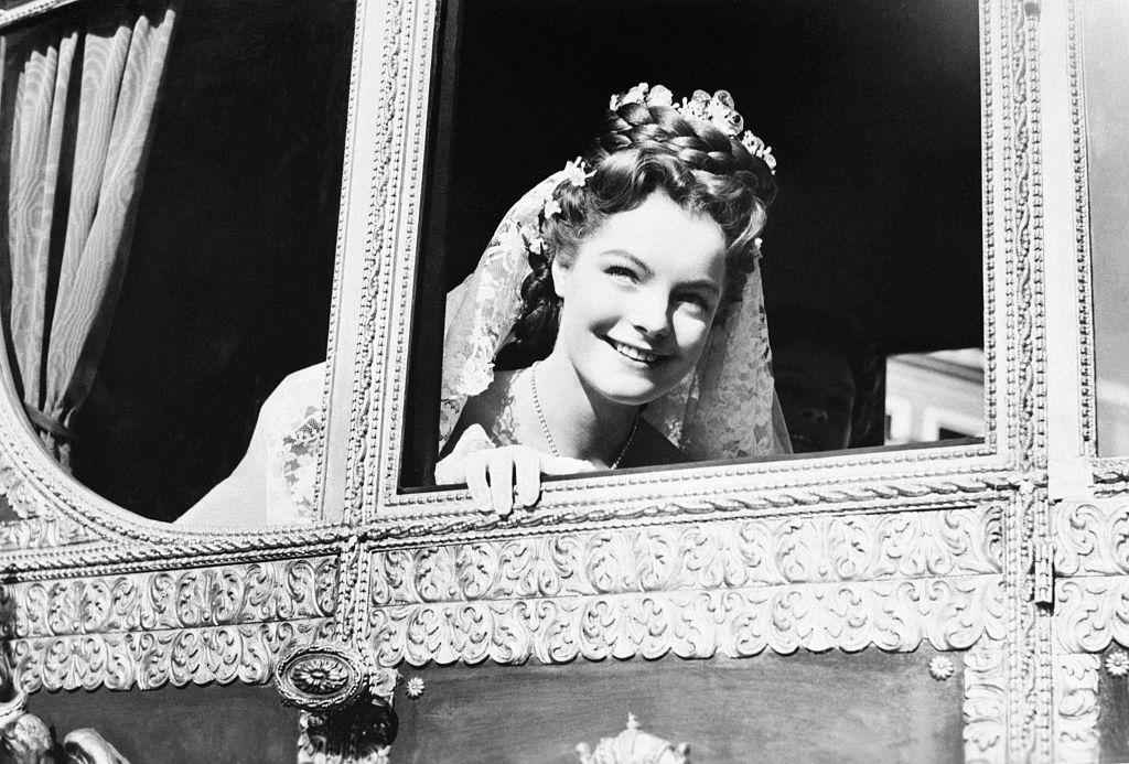 Austrian-born German actress Romy Schneider on the set of Sissi written and directed by Austrian Ernst Marischka. (Photo by Sunset Boulevard/Corbis via Getty Images)