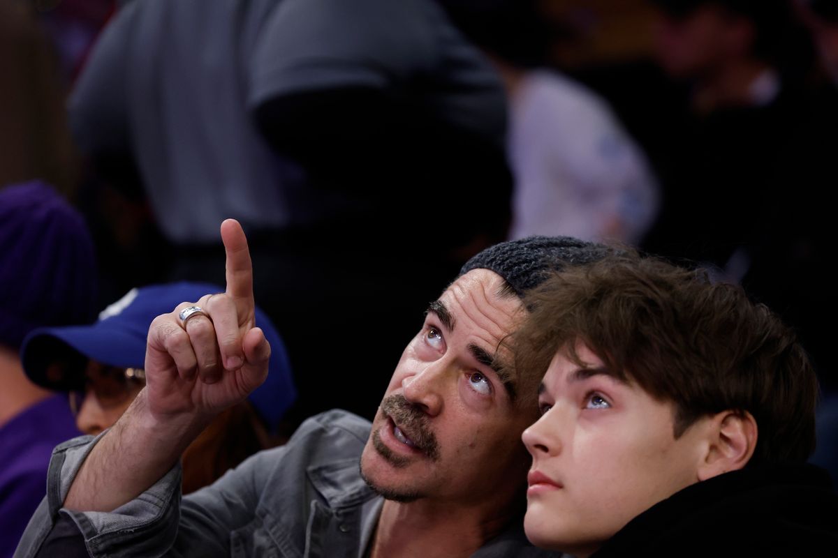 LOS ANGELES, CALIFORNIA - NOVEMBER 29: Irish actor Colin Farrell and his son James look on during the Emirates NBA Cup game between the Los Angeles Lakers and the Oklahoma City Thunder at Crypto.com Arena on November 29, 2024 in Los Angeles, California. NOTE TO USER: User expressly acknowledges and agrees that, by downloading and or using this photograph, User is consenting to the terms and conditions of the Getty Images License Agreement. (Photo by Ronald Martinez/Getty Images) (Photo by Ronald Martinez/Getty Images)