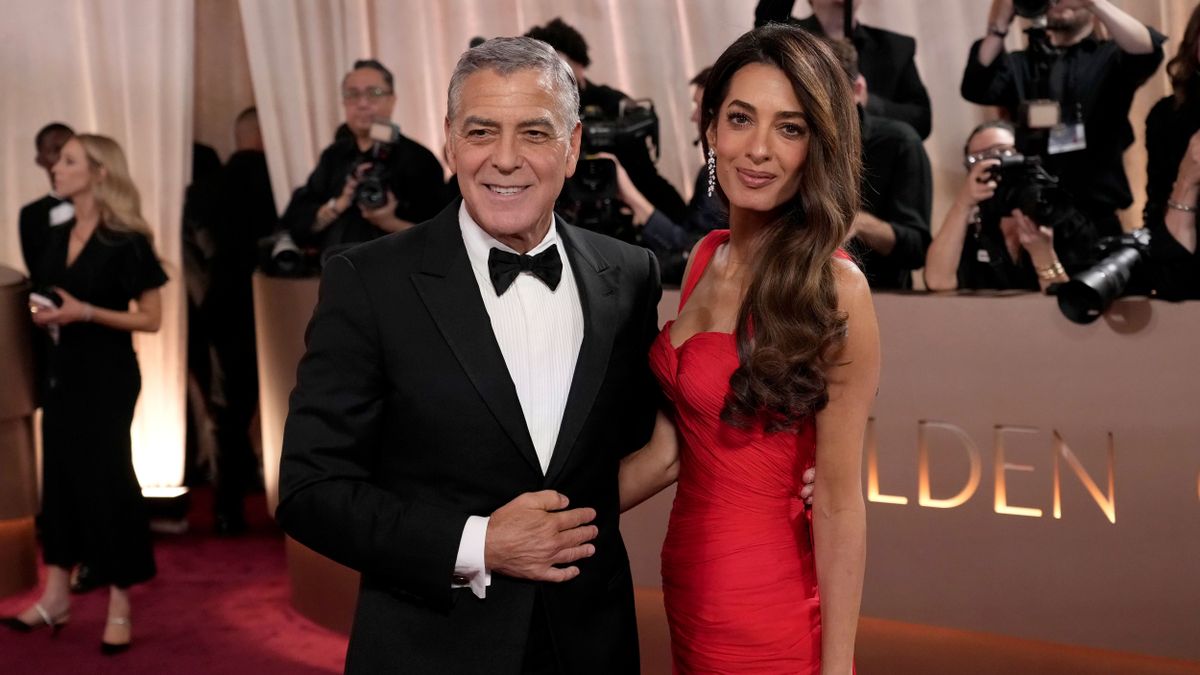 BEVERLY HILLS, CALIFORNIA - JANUARY 11: (FOR EDITORIAL USE ONLY) (L-R) George Clooney and Amal Clooney attend the 83rd Annual Golden Globe Awards at The Beverly Hilton on January 11, 2026 in Beverly Hills, California. (Photo by Jeff Kravitz/FilmMagic)