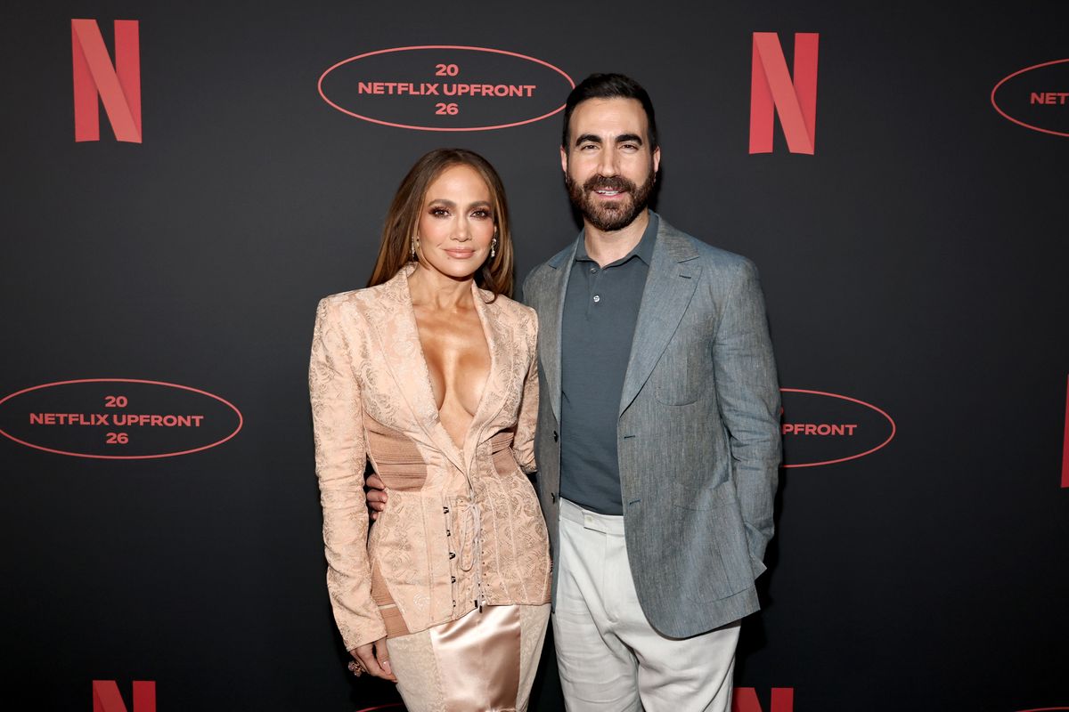 NEW YORK, NEW YORK - MAY 13: (L-R) Jennifer Lopez and Brett Goldstein attend the 2026 Netflix Upfront at Sunset Pier 94 Studios on May 13, 2026 in New York City. (Photo by Jamie McCarthy/Getty Images for Netflix)