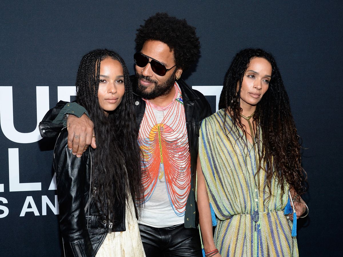 LOS ANGELES, CA - FEBRUARY 10:  Musician Lenny Kravitz (center) and actresses Zoe Kravitz (L) and Lisa Bonet R) attend the Saint Laurent show at The Hollywood Palladium on February 10, 2016 in Los Angeles, California.  (Photo by Kevork Djansezian/Getty Images)