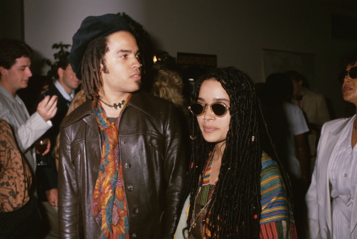 American singer-songwriter and musician Lenny Kravitz, wearing a brown leather jacket and a scarf, and American actress Lisa Bonet (Lilakoi Moon), wearing sunglasses, attend an event in New York City, New York, 17th August 1987.  (Photo by Vinnie Zuffante/Getty Images)