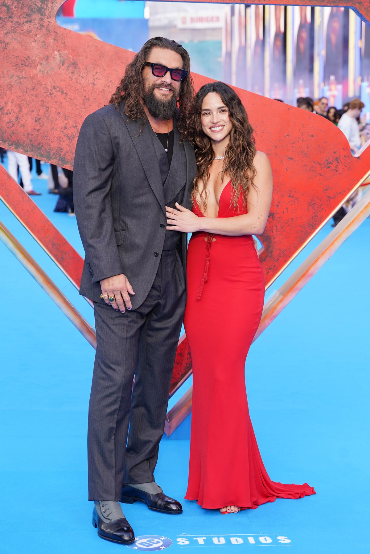 Jason Momoa and Adria Arjona arrive for a Supergirl fan event at Cineworld Leicester Square in central London. Picture date: Thursday June 18, 2026.