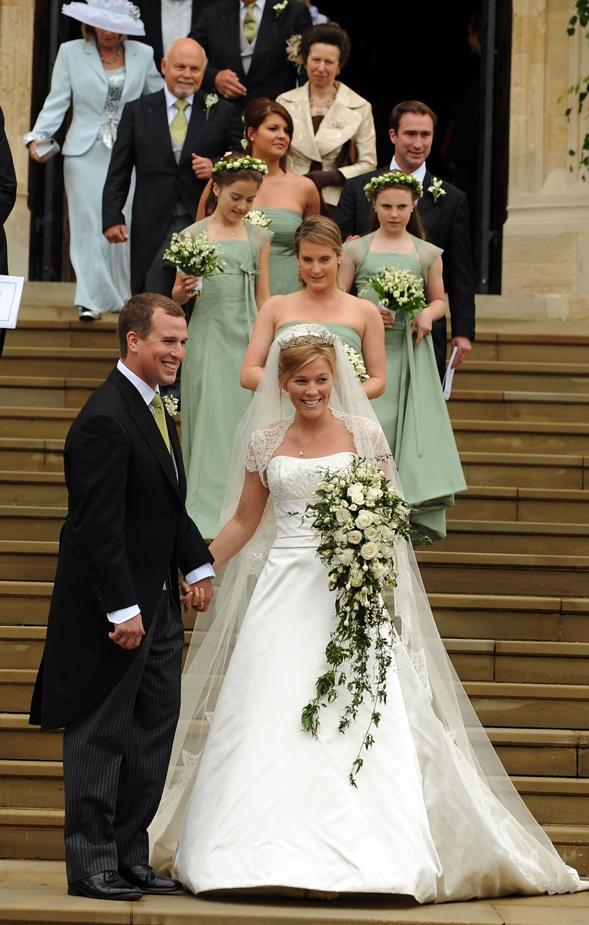 WINDSOR - MAY 17: Bride and groom, Autumn Kelly and Peter Phillips after their wedding ceremony at St George's Chapel, in Windsor Castle on May 17, 2008 in Windsor, England. (Photo by Anwar Hussein/WireImage)