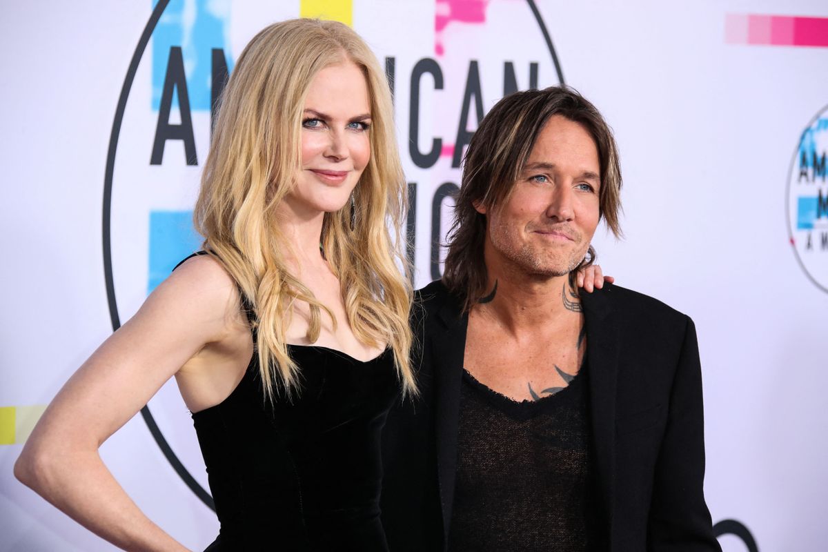 (FILE) Nicole Kidman and Keith Urban split after 19 years of marriage on Monday, September 29, 2025. LOS ANGELES, CALIFORNIA, USA - NOVEMBER 19: Australian-American actress and producer Nicole Kidman and husband/Australian-American country music singer, guitarist, and songwriter Keith Urban arrive at the 2017 American Music Awards held at the Microsoft Theatre L.A. Live on November 19, 2017 in Los Angeles, California, United States. (Photo by Xavier Collin/Image Press Agency/NurPhoto) (Photo by Image Press Agency / NurPhoto via AFP)