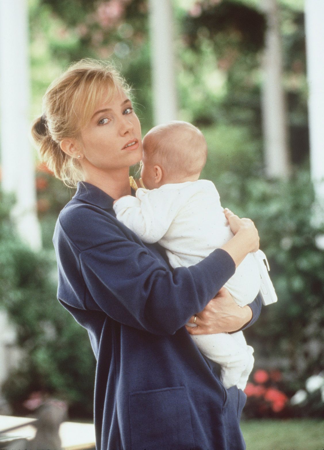 'The Hand That Rocks the Cradle' by Curtis Hanson; starring Rebecca De Mornay, Madeline Zima. Made in USA, 1992.