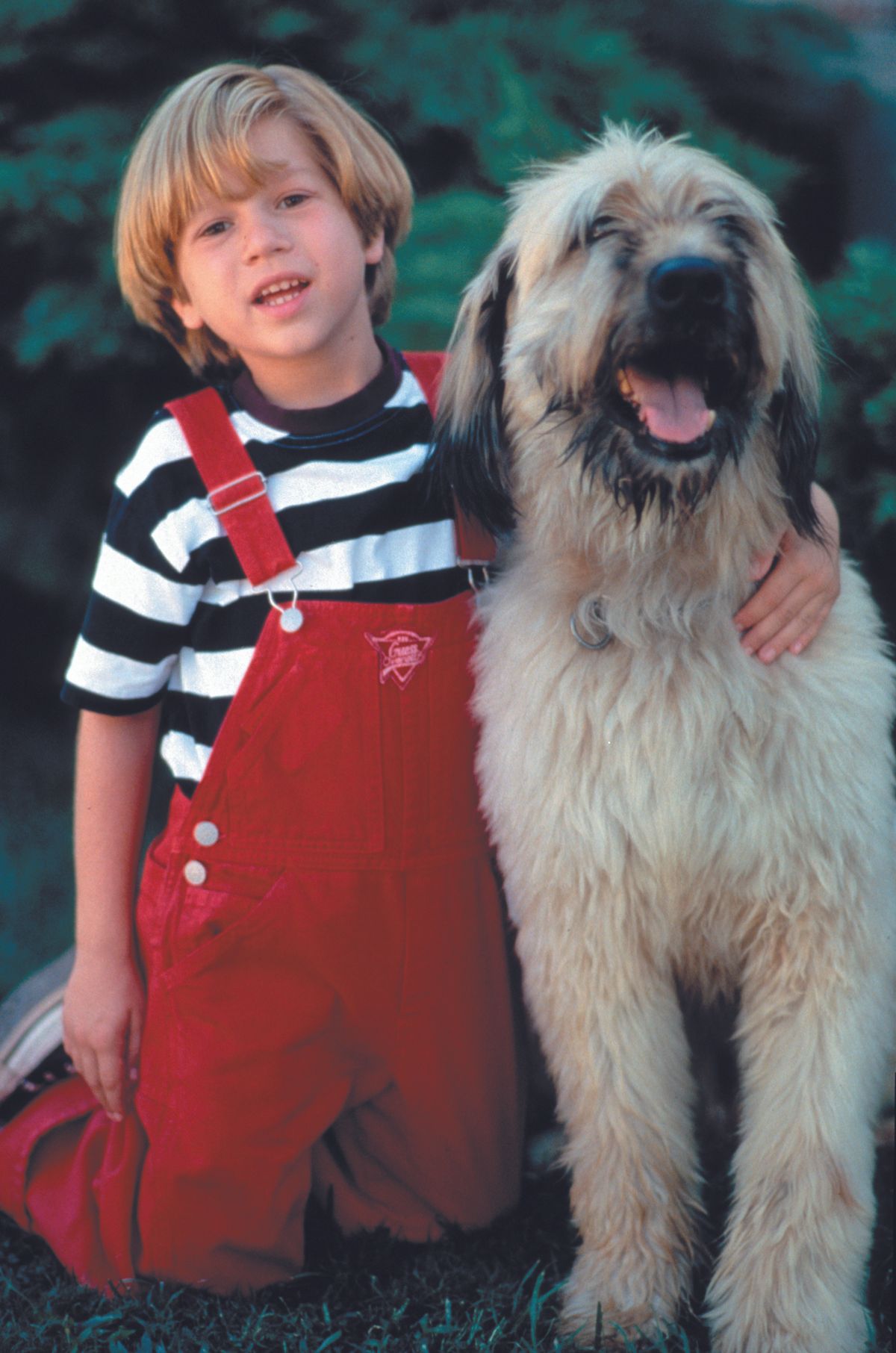 RELEASE DATE: 14 July 1998. MOVIE TITLE: Dennis the Menace Strikes Again! - STUDIO: Outlaw Productions . PLOT: The day starts out fine, it's Mr. Wilson's birthday and guess who shows up uninvited? Dennis and a few of his bug friends. PICTURED: JUSTIN COOPER as Dennis Mitchell. 