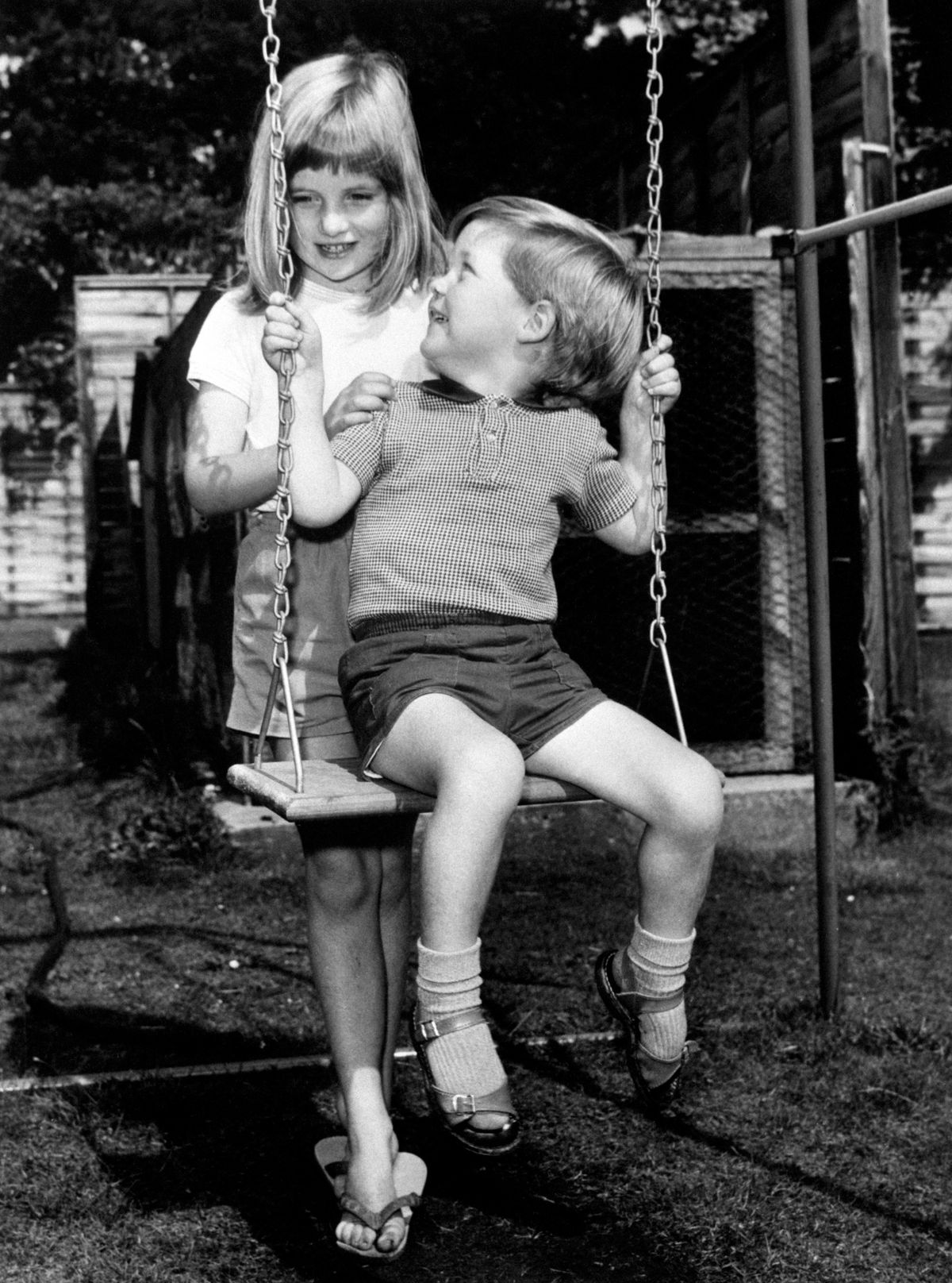 EDITORIAL USE ONLY: 1967: Lady Diana Spencer (later the Princess of Wales), youngest daughter of Earl Spencer, at Park House, Sandringham, Norfolk, in the Summer of 1967 with her brother, Charles, Viscount Althorp, a former Page of Honour to the Queen.